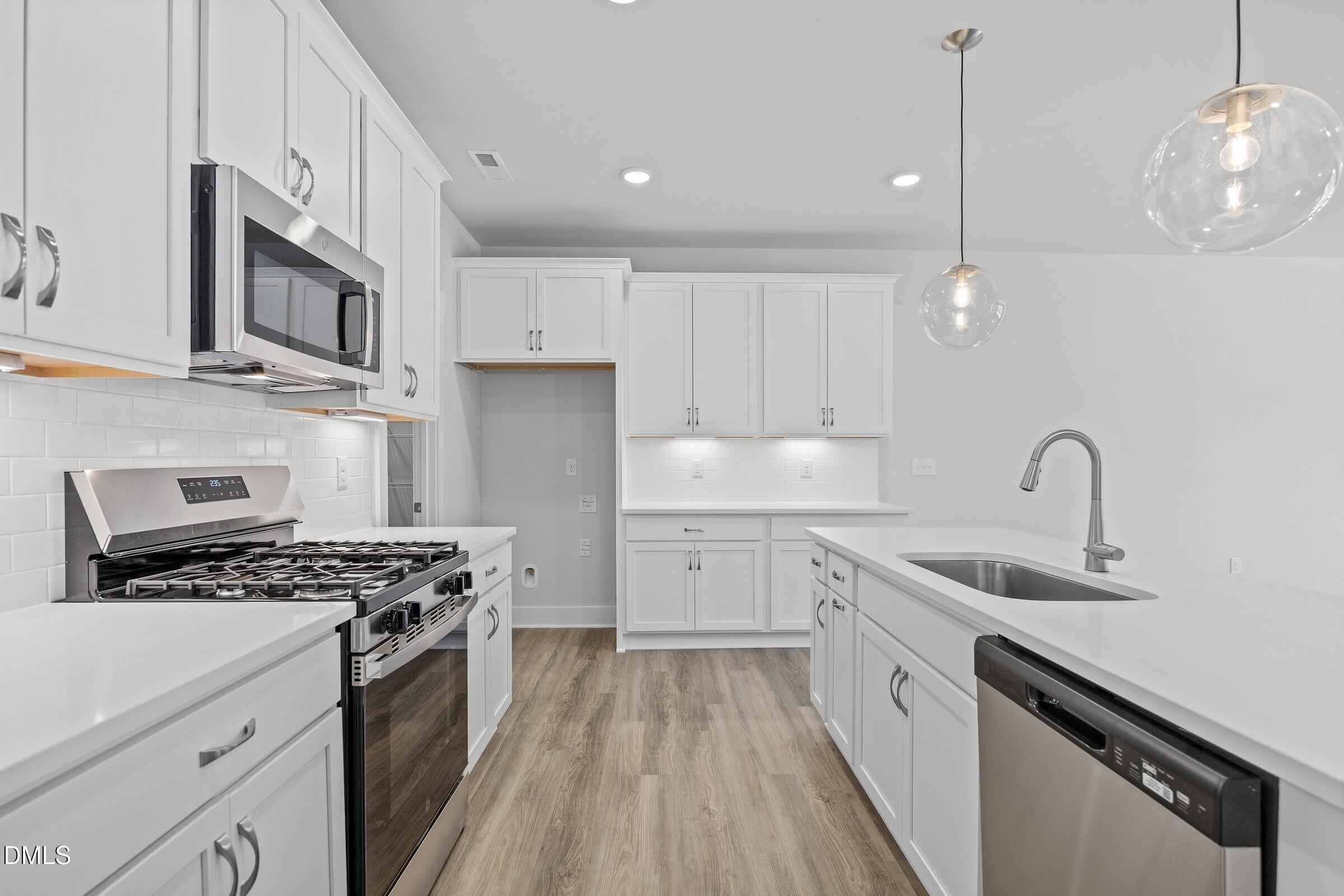 2916 Alyssa Court Raleigh, NC 27604 - Photo 9 of 21 Kitchen - Classic White Button