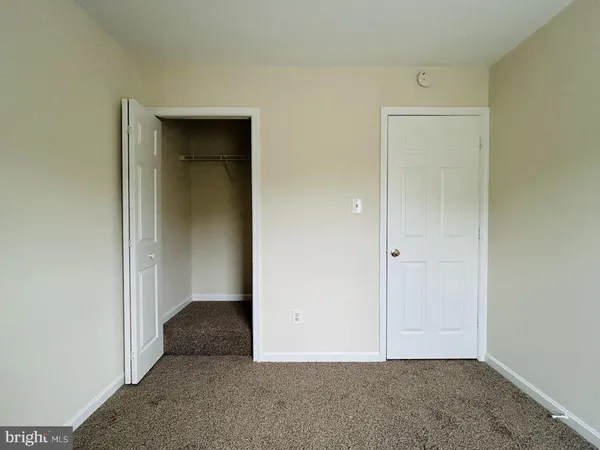 an empty room with closet