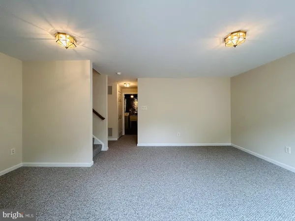 a view of a room with a utility room