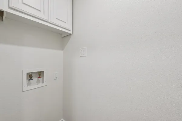 wooden floor and cabinet in a room