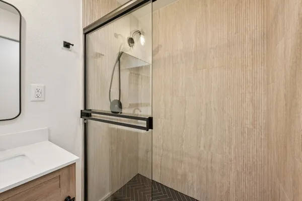 a bathroom with a sink and a mirror