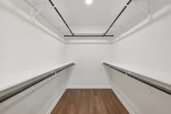 a bathroom with a shower and a sink