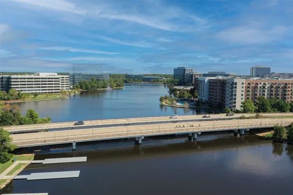 a view of swimming pool and outdoor seating