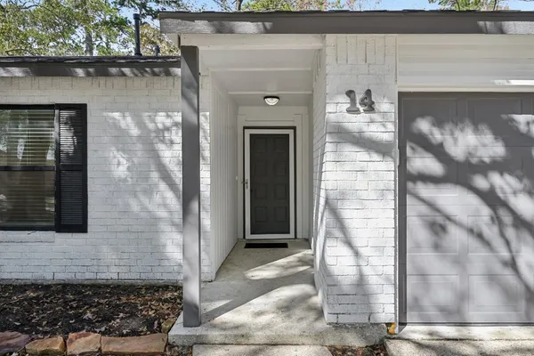 a front view of a house with a glass door