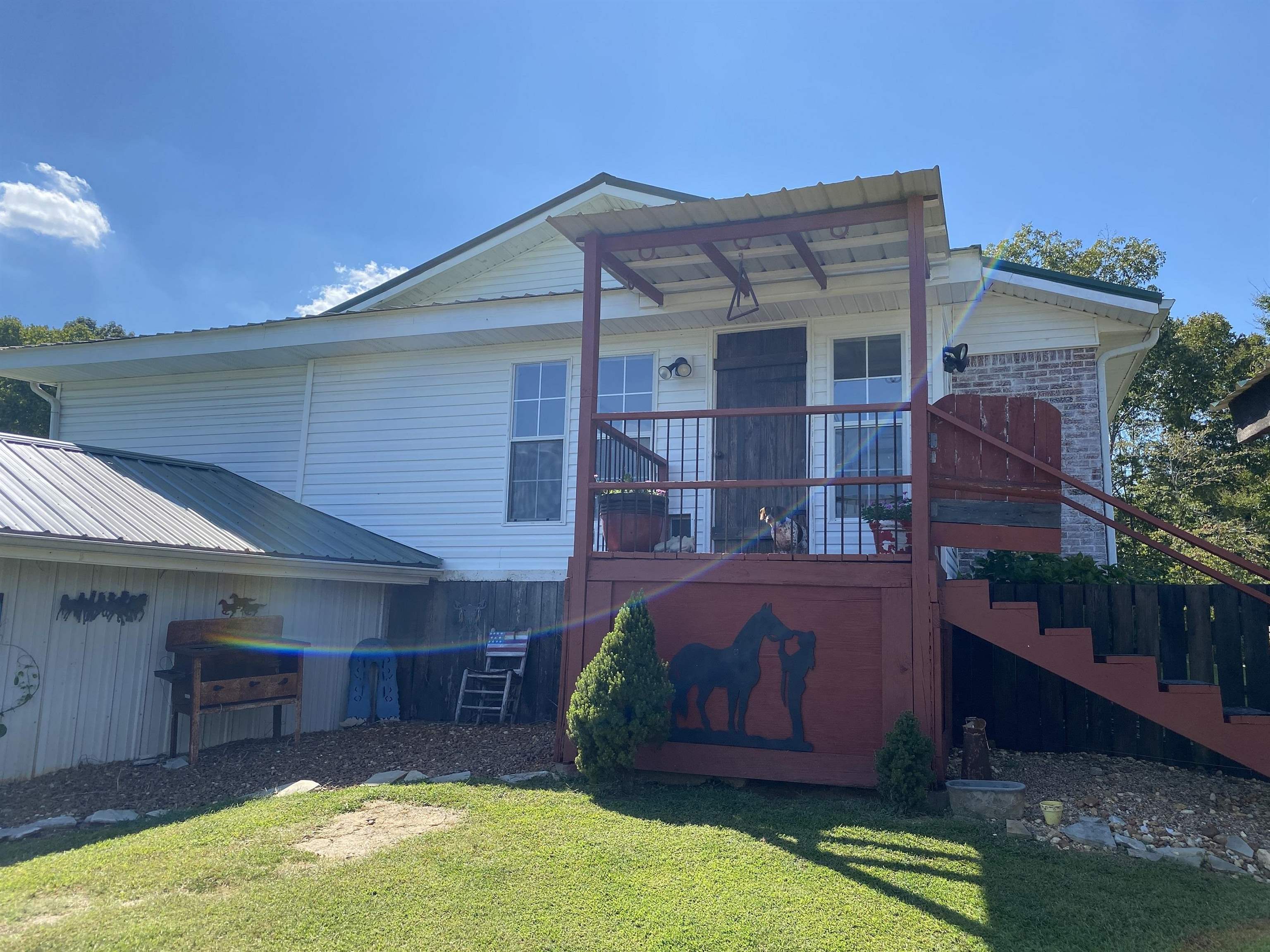 90 Dickson Road Sardis, TN 38371 - Photo 19 of 25 a view of a house with a yard