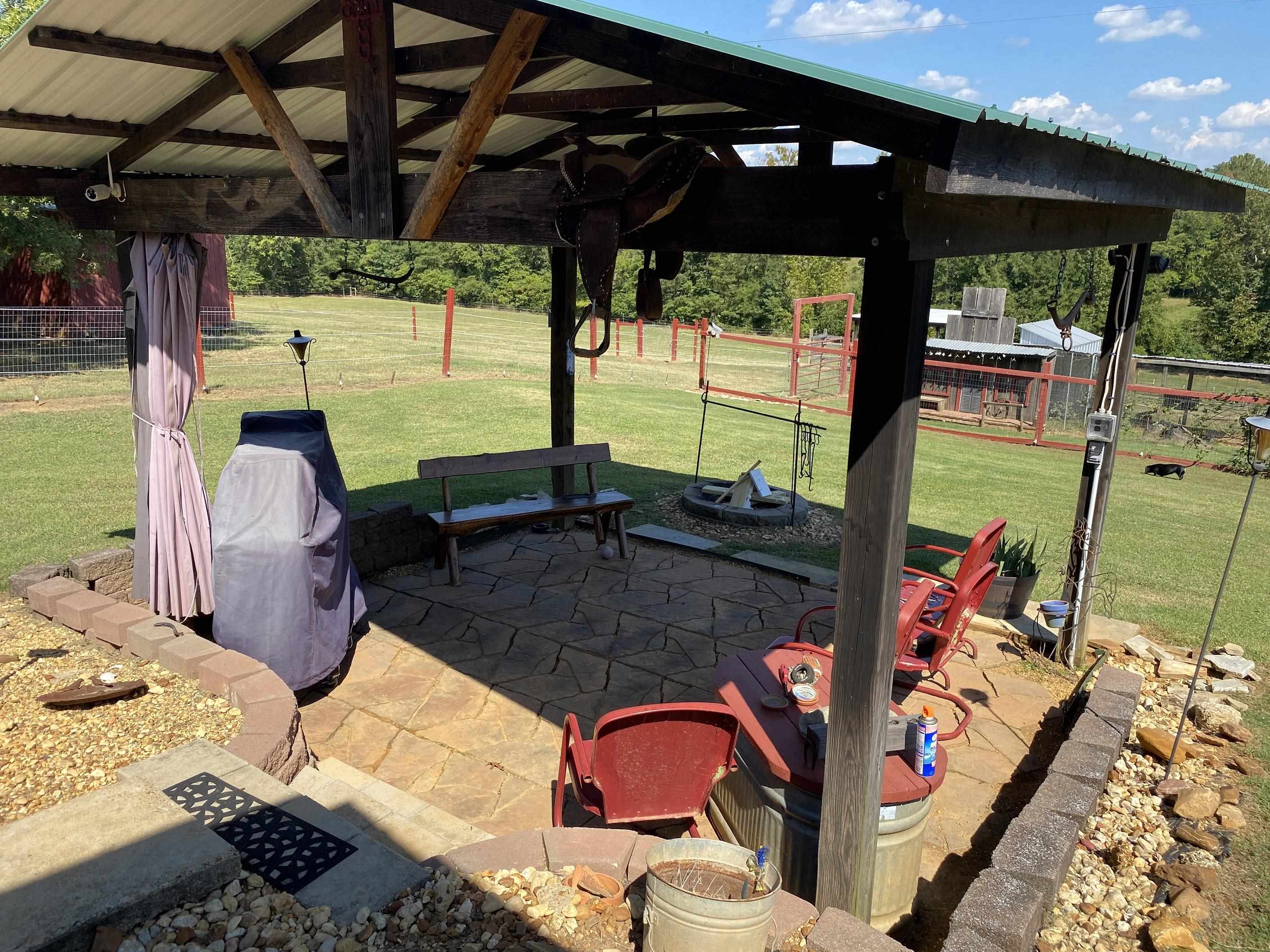 90 Dickson Road Sardis, TN 38371 - Photo 20 of 25 a view of swimming pool with a patio