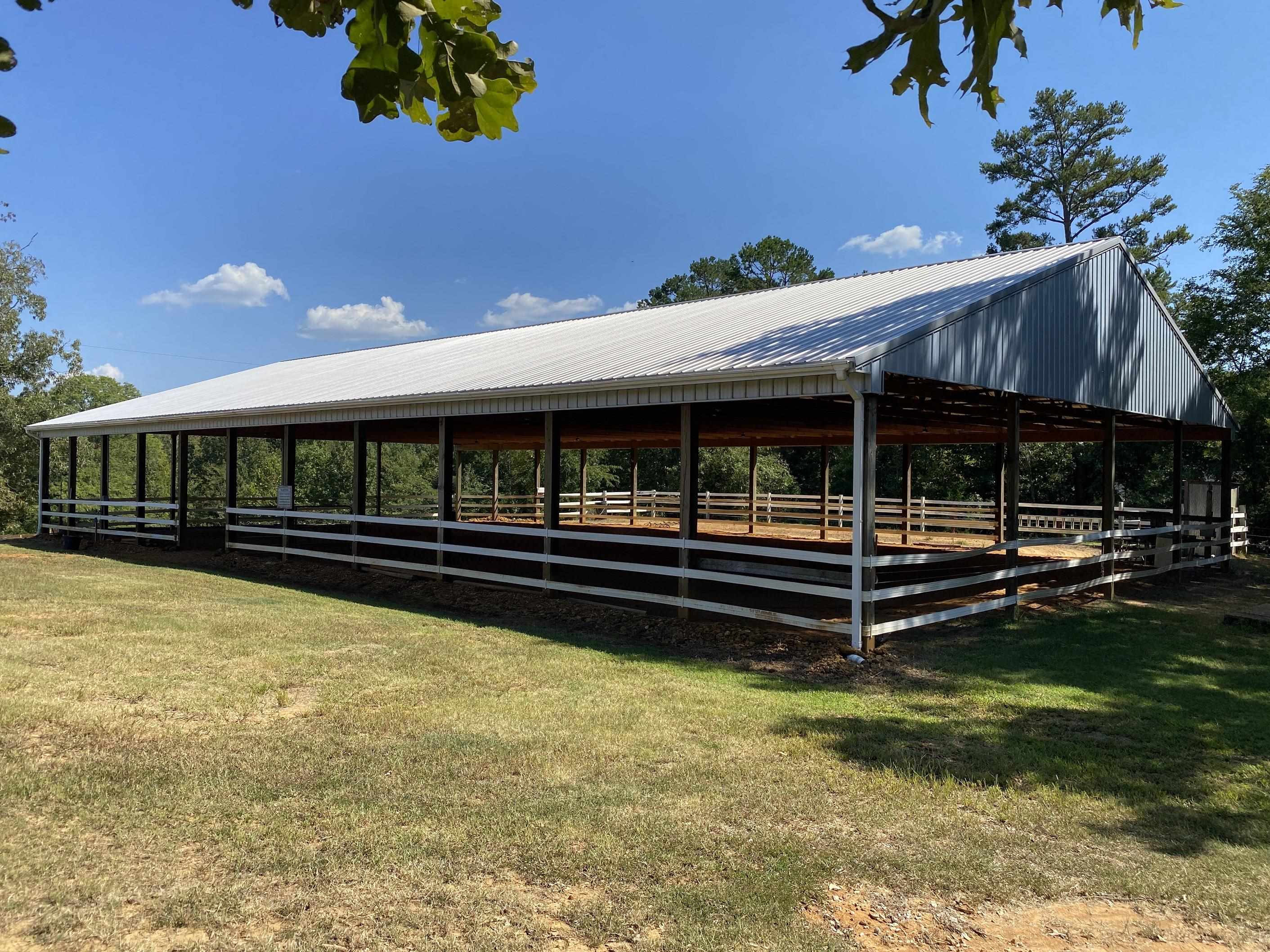 90 Dickson Road Sardis, TN 38371 - Photo 4 of 25 a view of house with swimming pool