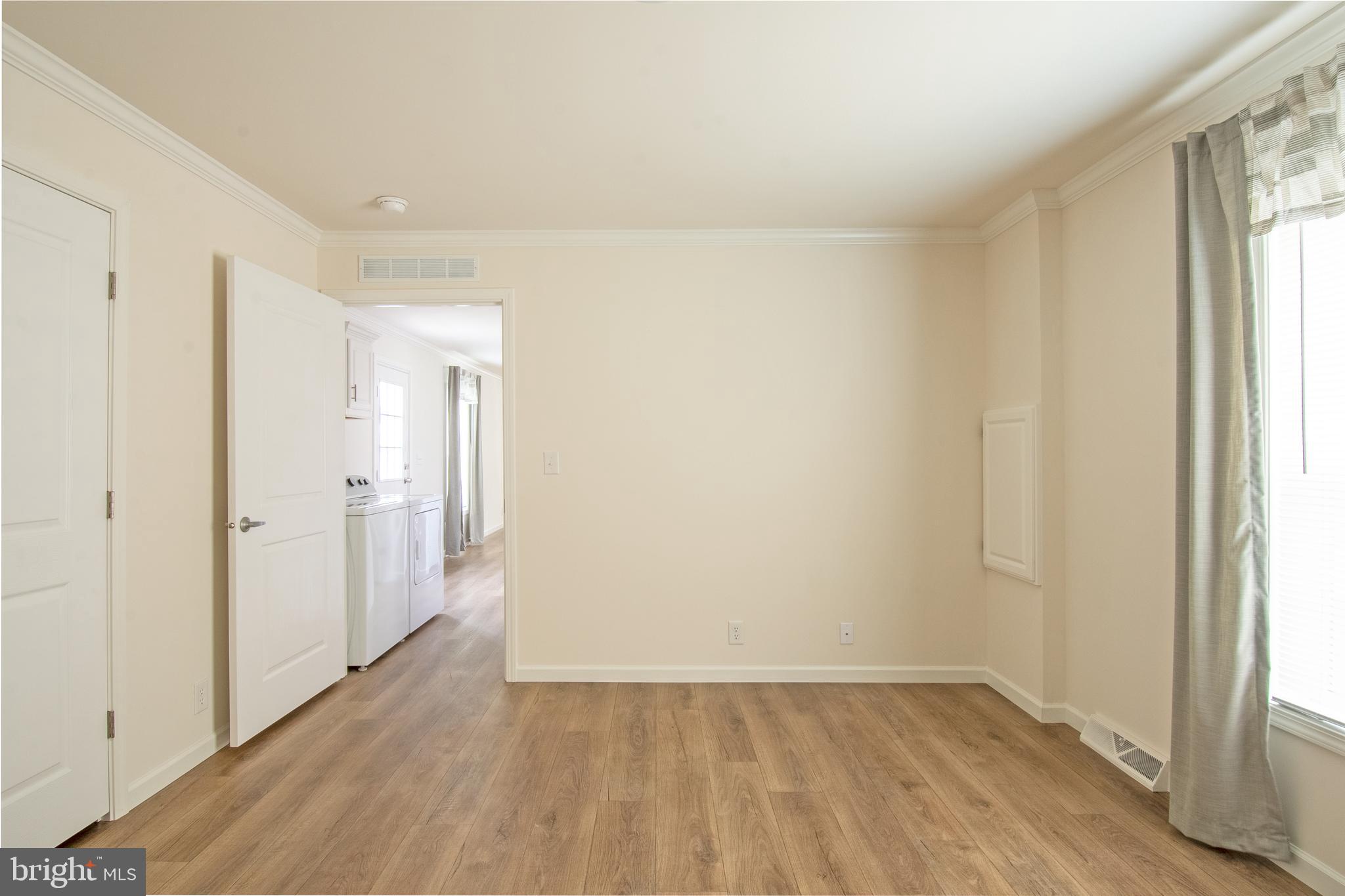 1679 South State Street, Unit A8 Dover, DE 19901 - Photo 19 of 19 a view of an empty room and window