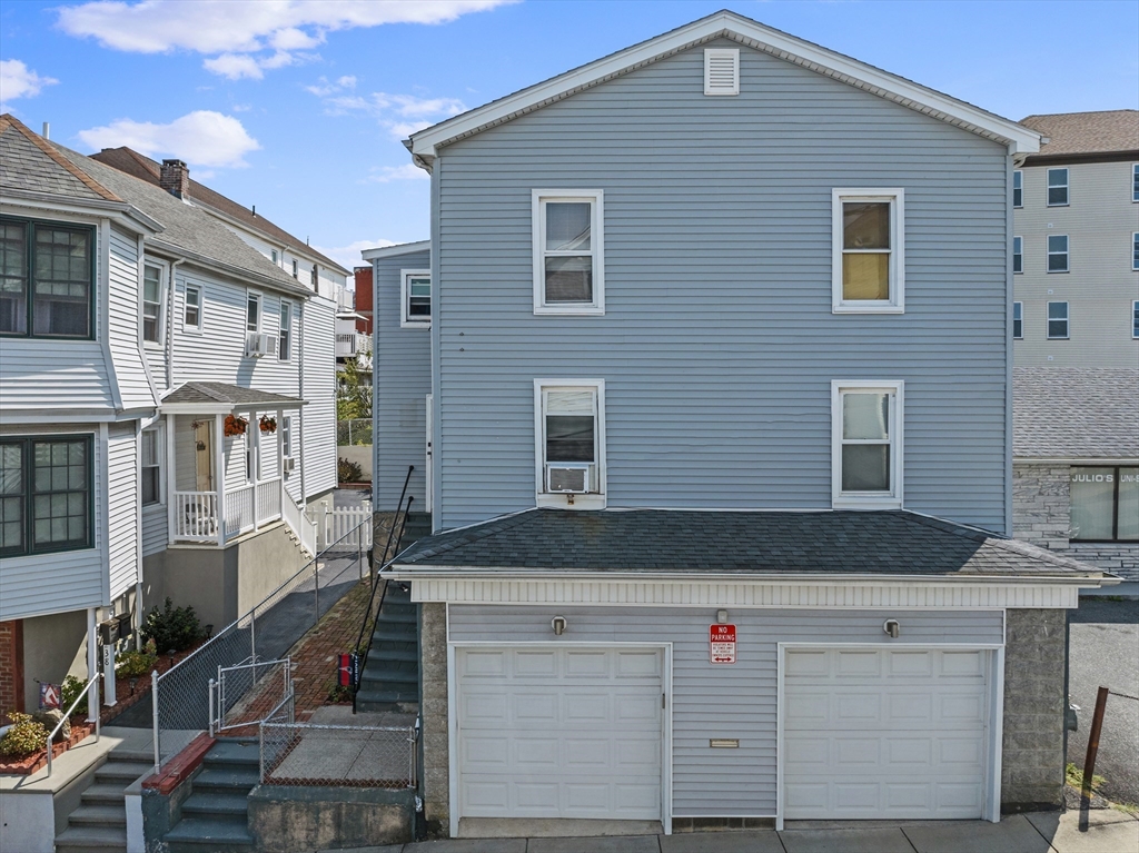 242 Washington Street Fall River, MA 02721 - Photo 2 of 23 a black and white building with a outdoor space