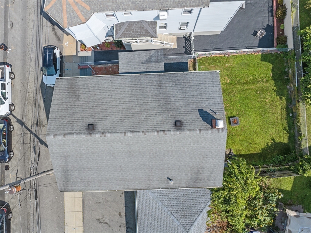 242 Washington Street Fall River, MA 02721 - Photo 4 of 23 an aerial view of a house with a yard
