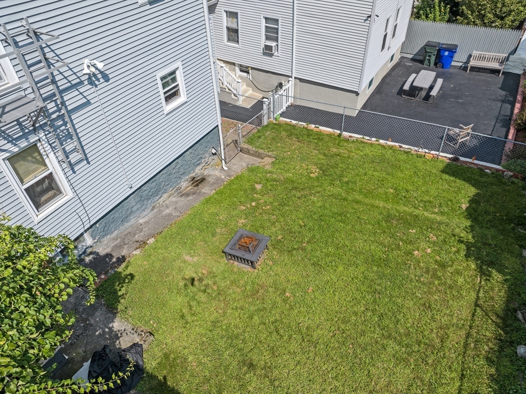 242 Washington Street Fall River, MA 02721 - Photo 6 of 23 a view of back yard of the house