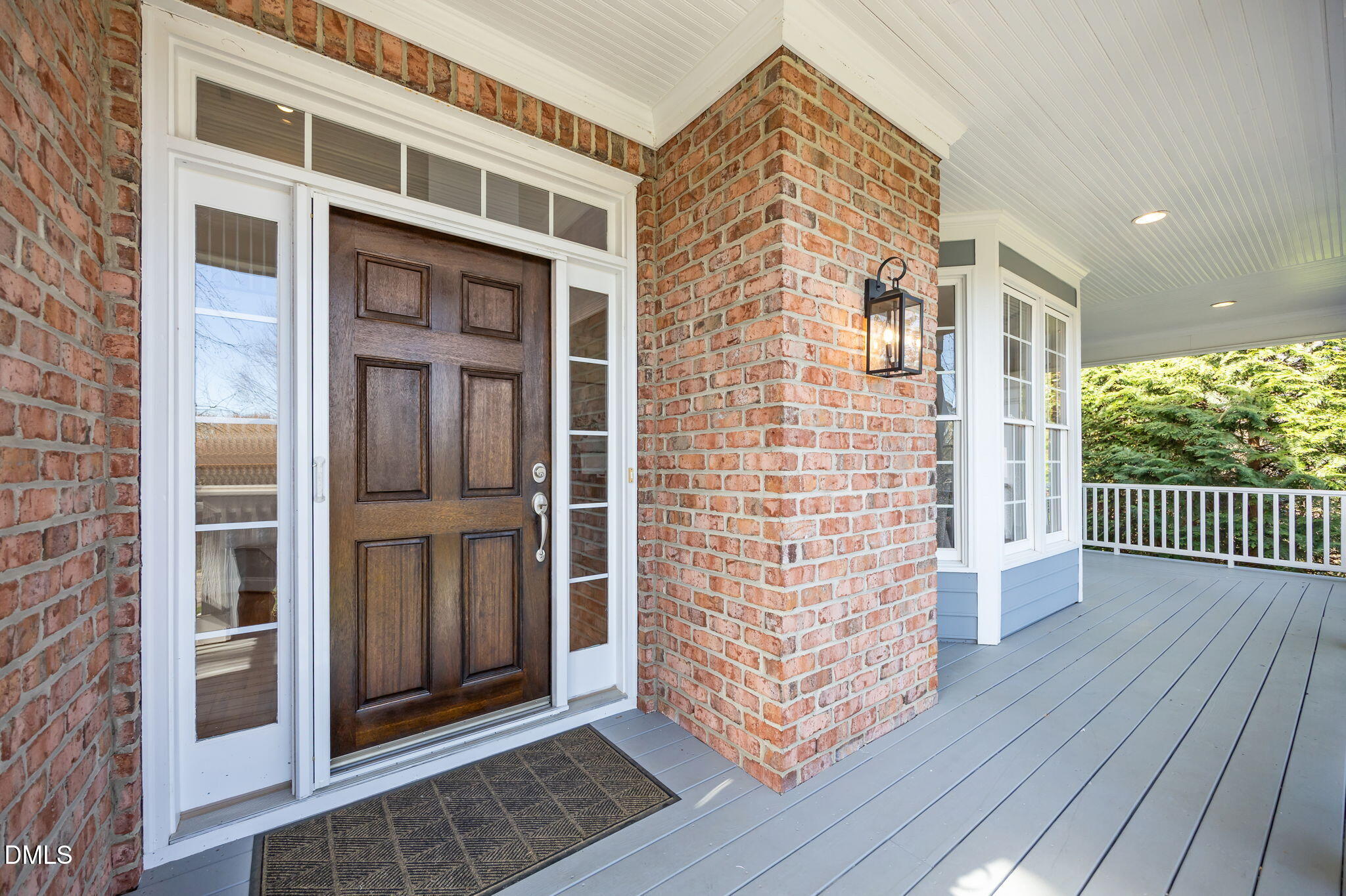 111 Lake Ridge Place Chapel Hill, NC 27516 - Photo 8 of 84 a view of wooden door with brick walls