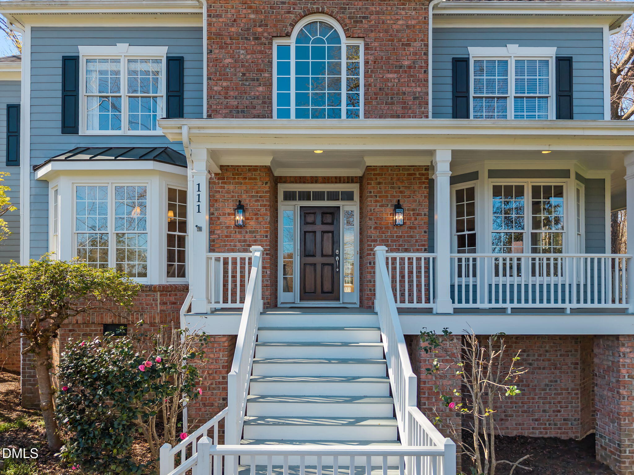 111 Lake Ridge Place Chapel Hill, NC 27516 - Photo 13 of 84 front view of a brick house with a large window