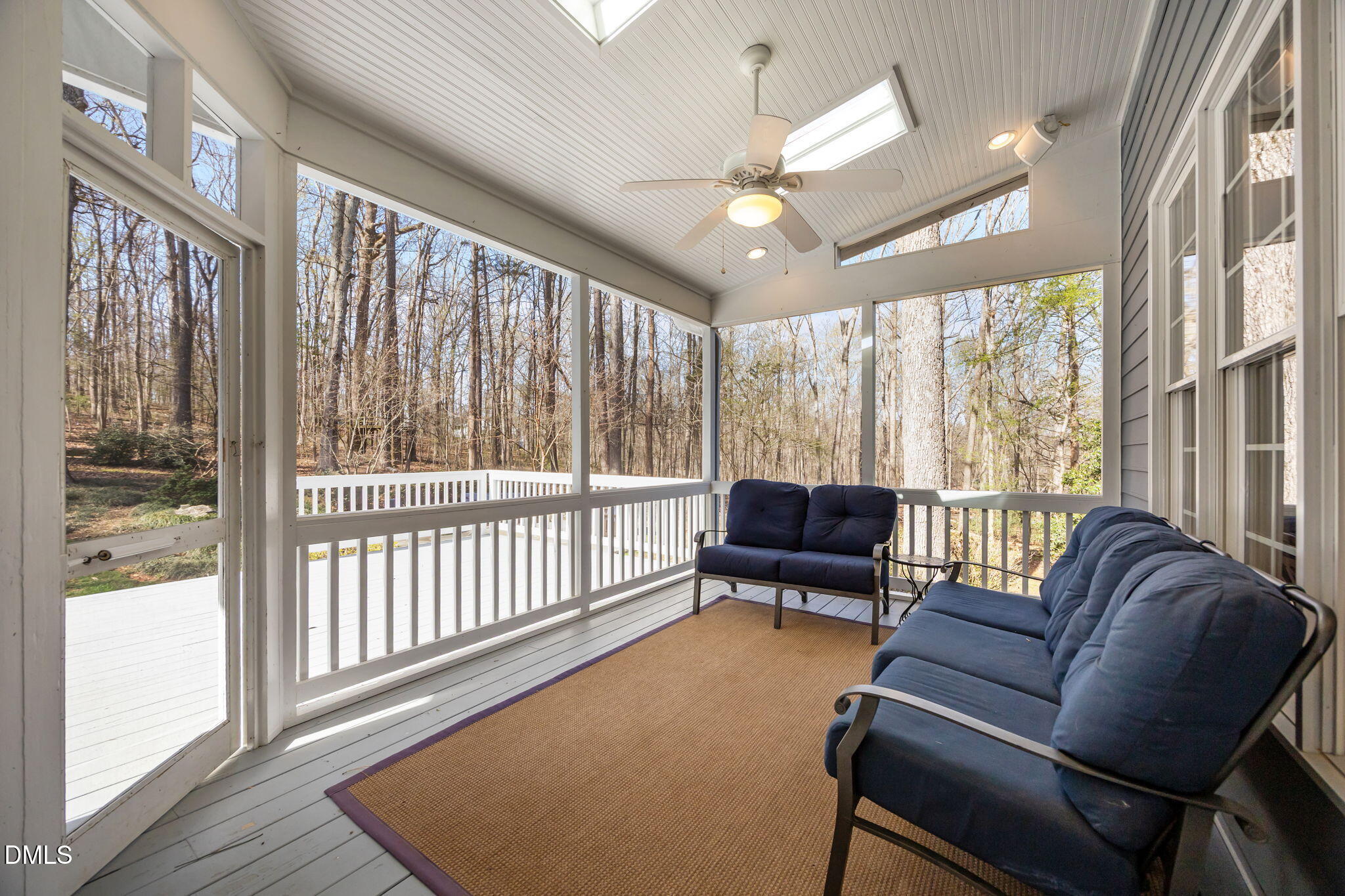 111 Lake Ridge Place Chapel Hill, NC 27516 - Photo 18 of 84 a living room with furniture and a large window