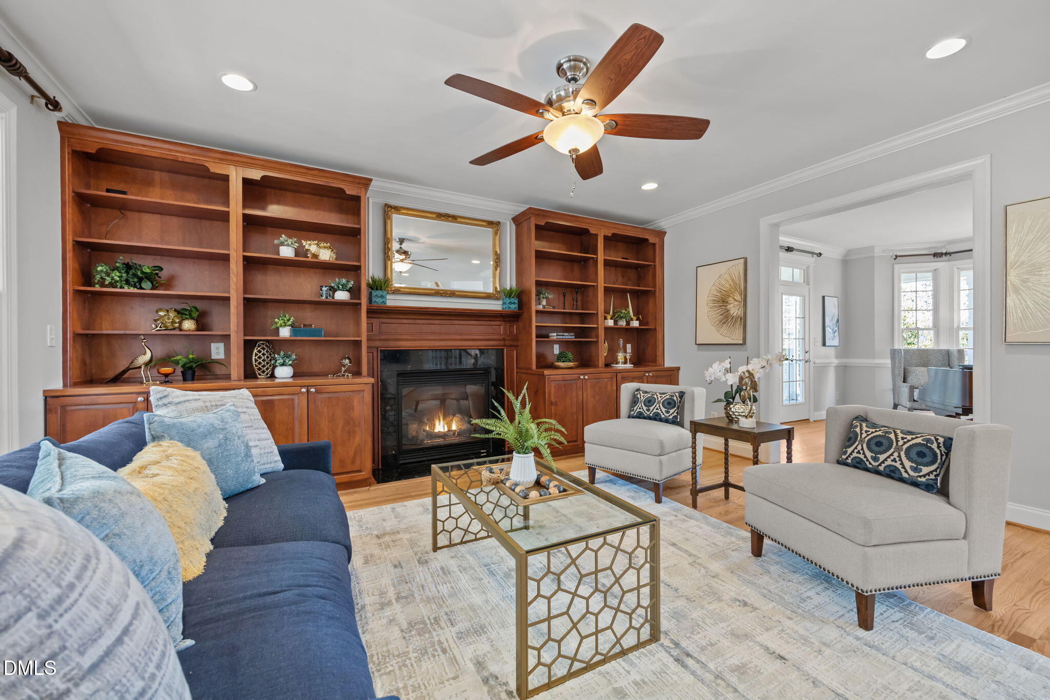 111 Lake Ridge Place Chapel Hill, NC 27516 - Photo 45 of 84 a living room with furniture a fireplace and a large window