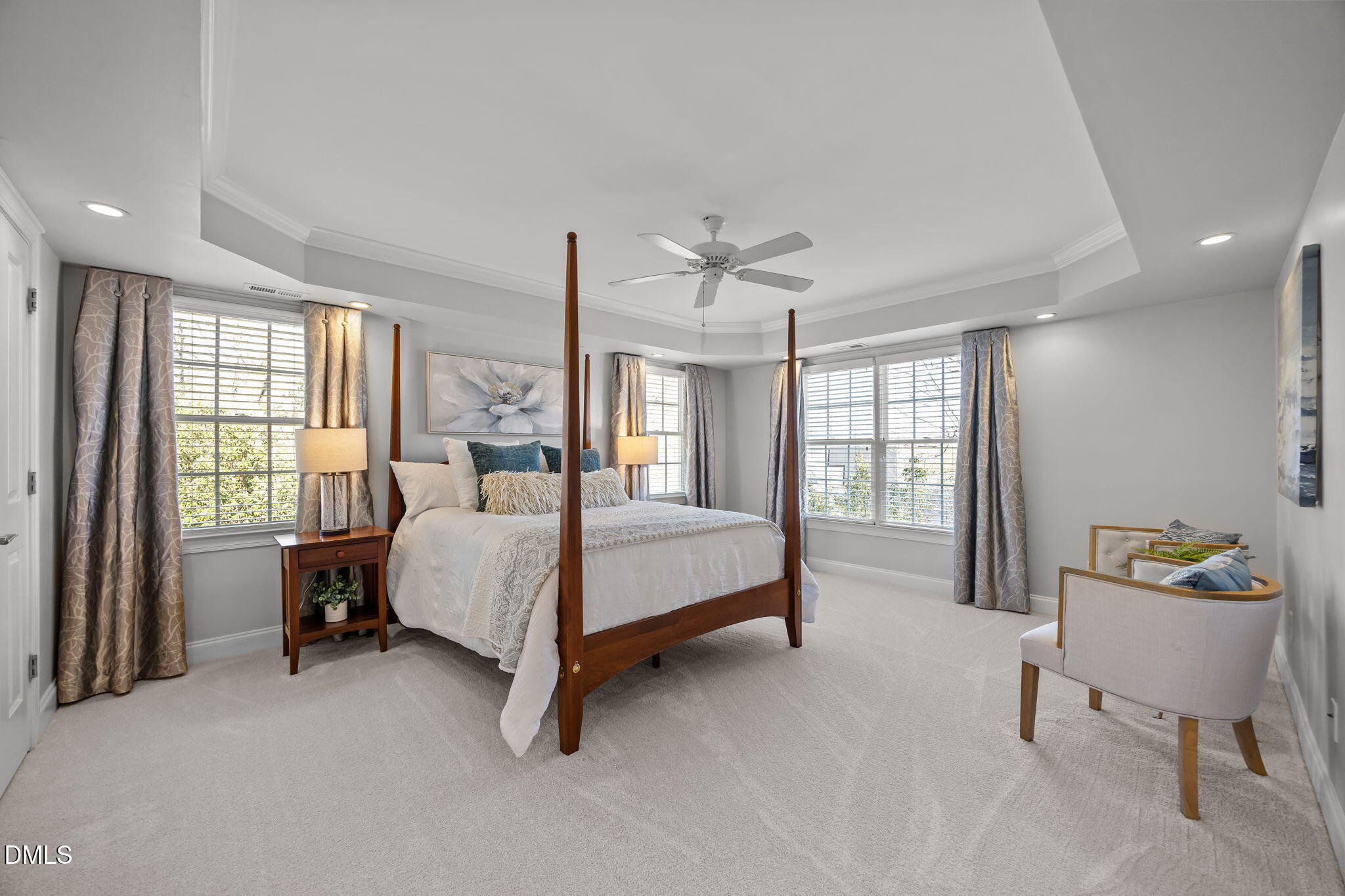 111 Lake Ridge Place Chapel Hill, NC 27516 - Photo 53 of 84 a bed room with a bed and a chair