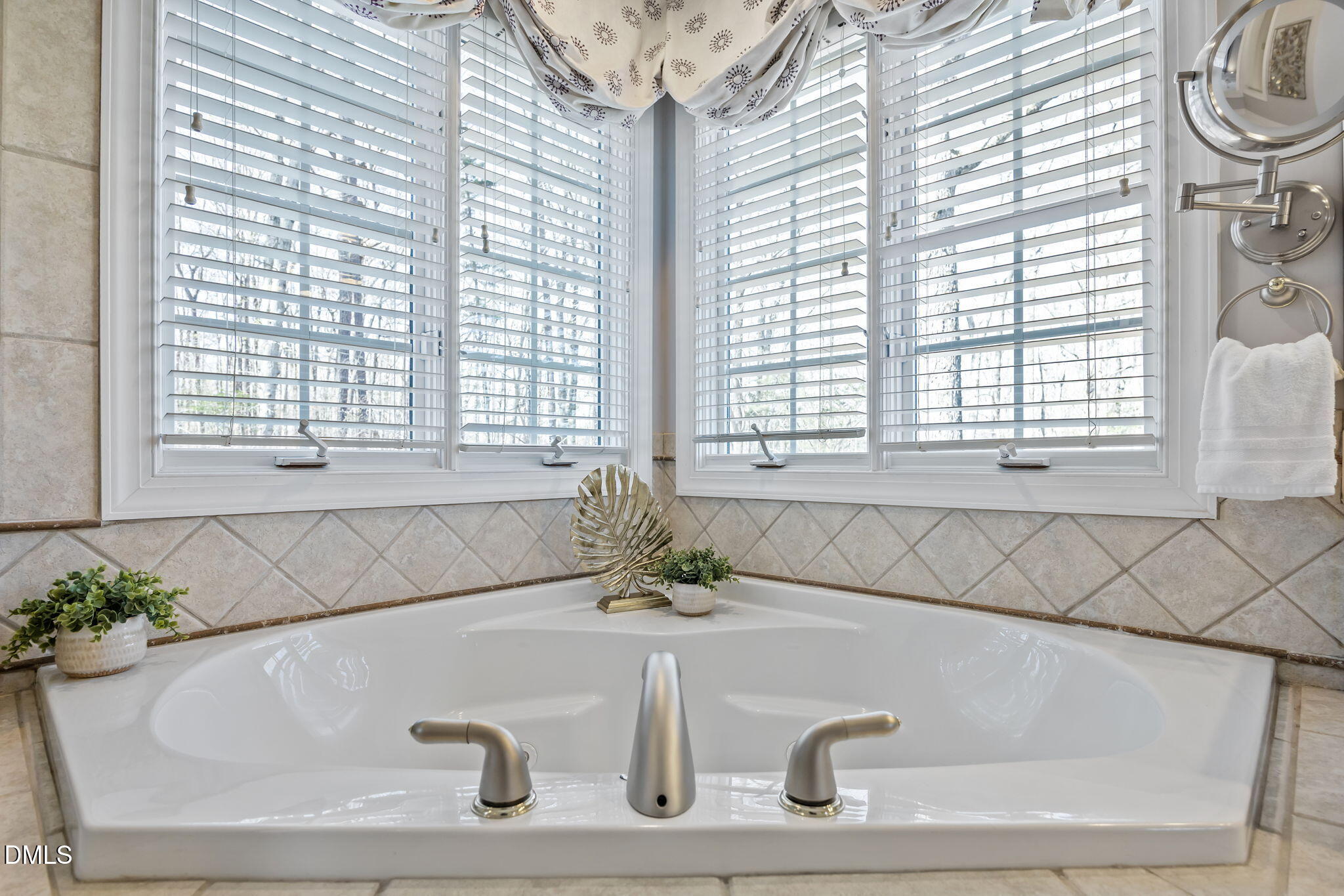 111 Lake Ridge Place Chapel Hill, NC 27516 - Photo 57 of 84 a bath tub sitting in a bathroom next to a window