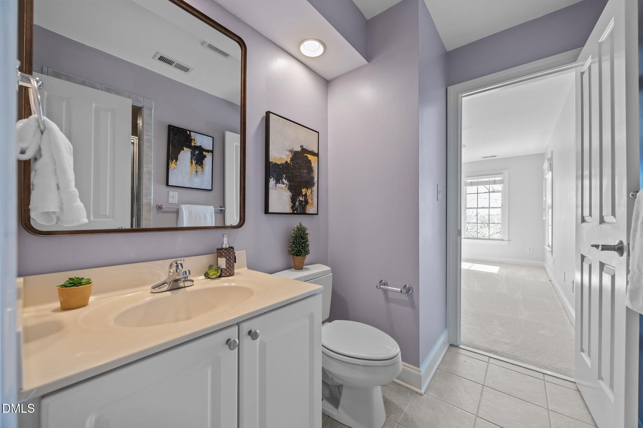 111 Lake Ridge Place Chapel Hill, NC 27516 - Photo 61 of 84 a bathroom with a sink and a mirror