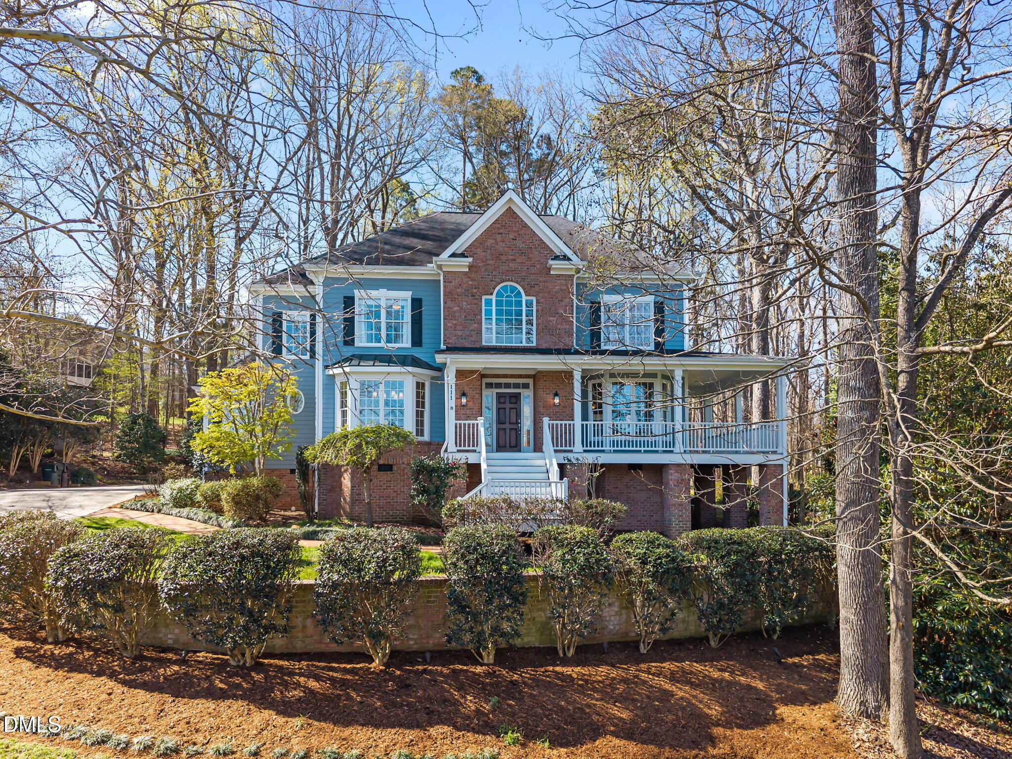 111 Lake Ridge Place Chapel Hill, NC 27516 - Photo 5 of 84 a front view of a house with garden