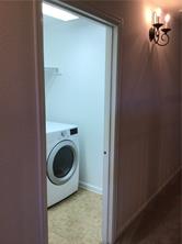 14812 Avery Ranch Boulevard, Unit 64 Austin, TX 78717 - Photo 18 of 26 a utility room with dryer and washer