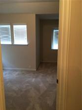 14812 Avery Ranch Boulevard, Unit 64 Austin, TX 78717 - Photo 21 of 26 a view of an empty room with a window