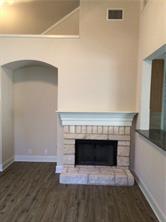 14812 Avery Ranch Boulevard, Unit 64 Austin, TX 78717 - Photo 6 of 26 a white building with a fireplace