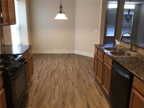 14812 Avery Ranch Boulevard, Unit 64 Austin, TX 78717 - Photo 10 of 26 a kitchen with a sink and wooden floor