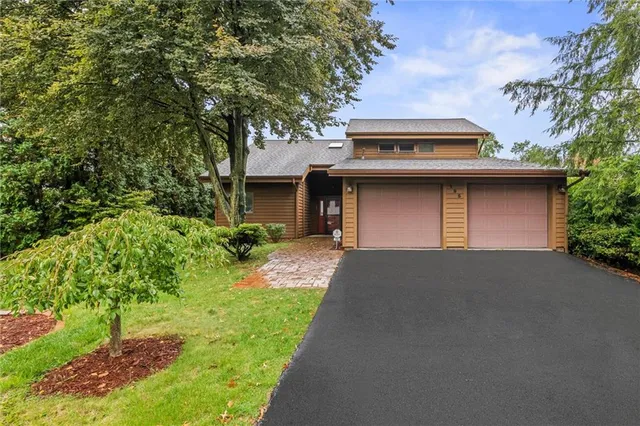 a front view of house with yard