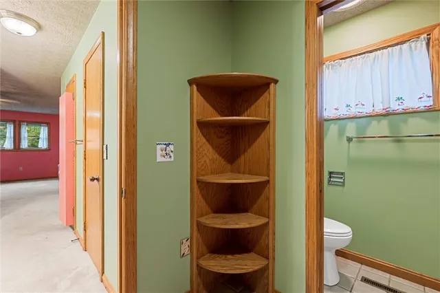 a view of an empty room with a balcony