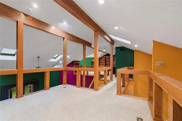 a porch with a fireplace in front of it