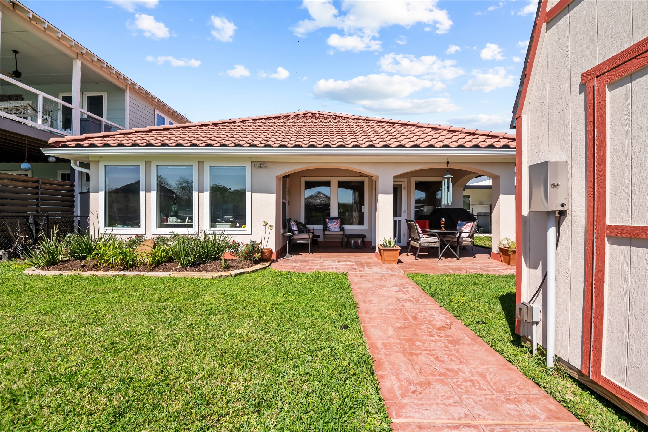 615 28th Street Dickinson, TX 77539 - Photo 24 of 34 a view of a house with garden and porch