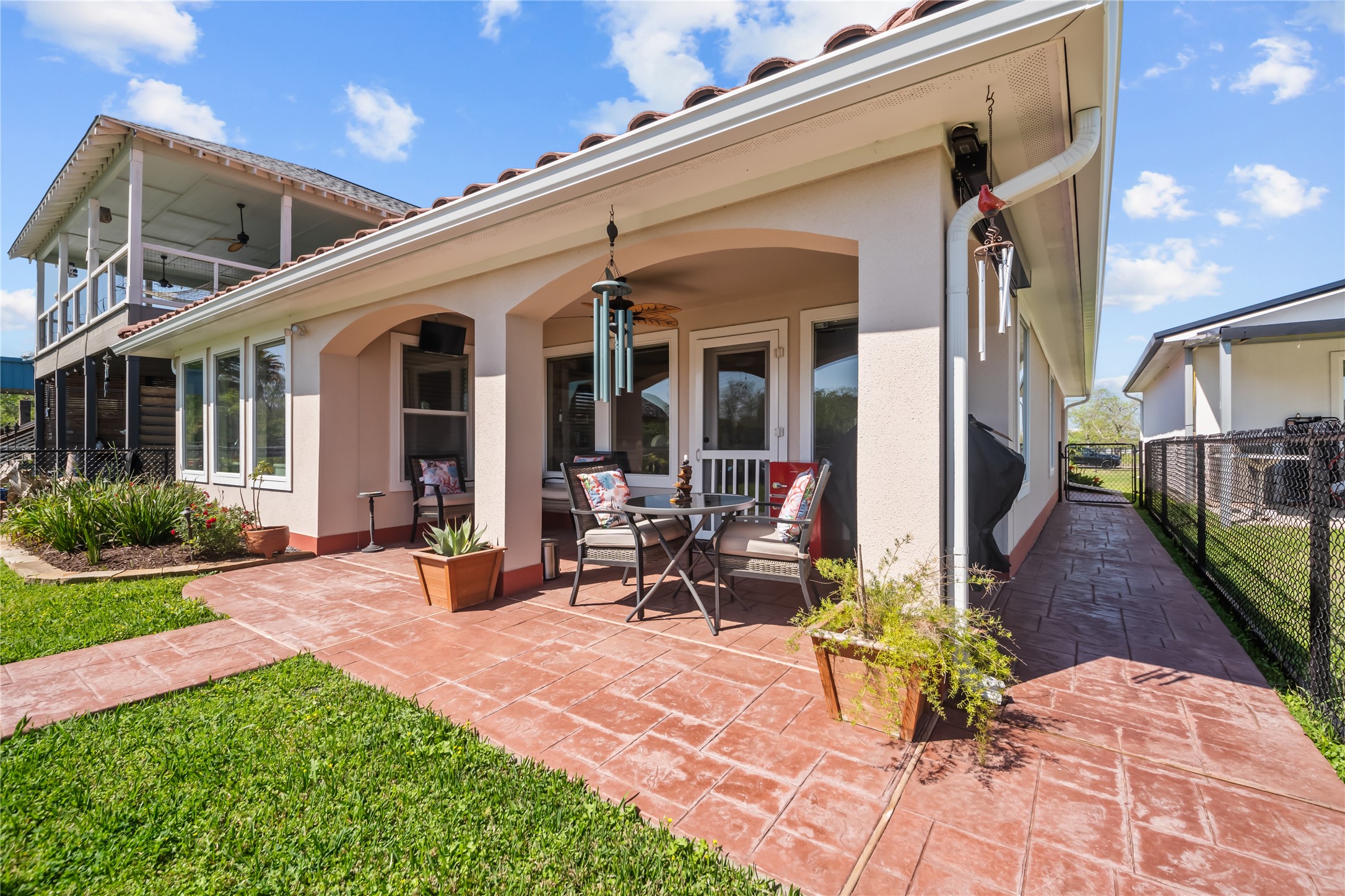 615 28th Street Dickinson, TX 77539 - Photo 26 of 34 a view of a house with garden and sitting area