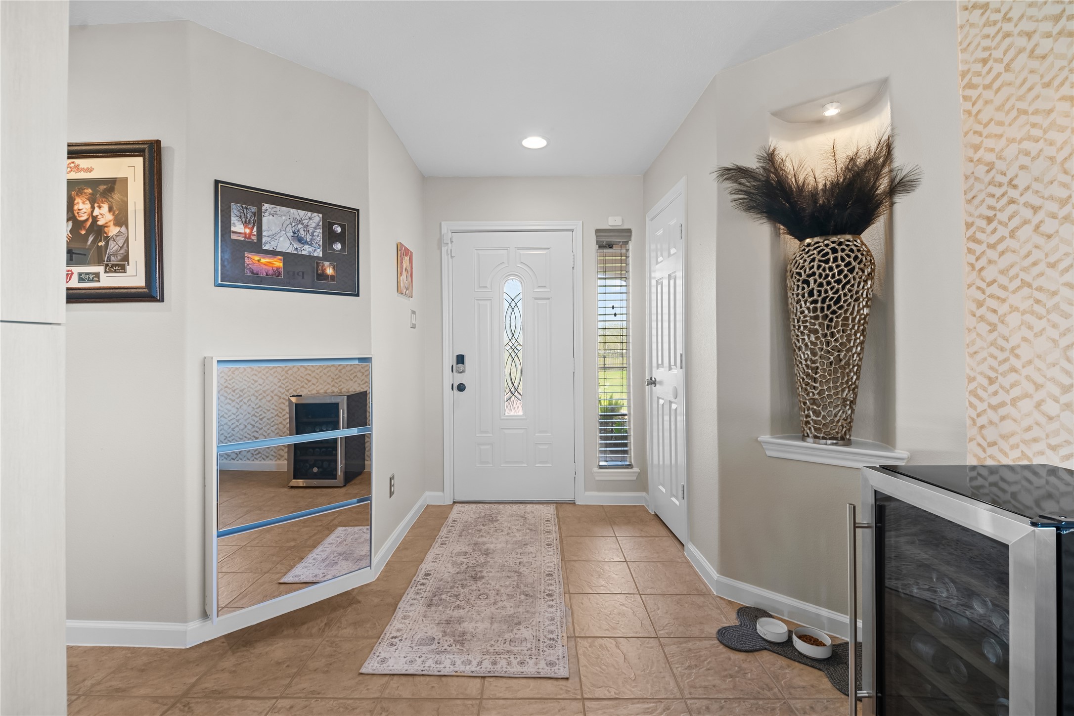 615 28th Street Dickinson, TX 77539 - Photo 5 of 34 a view of hallway with livingroom and stairs