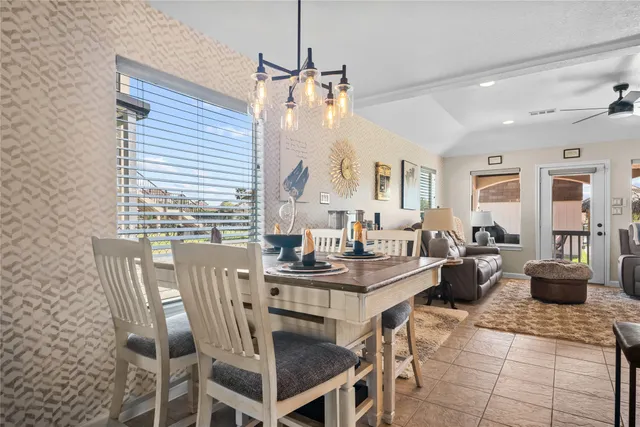 a view of a dining room with furniture