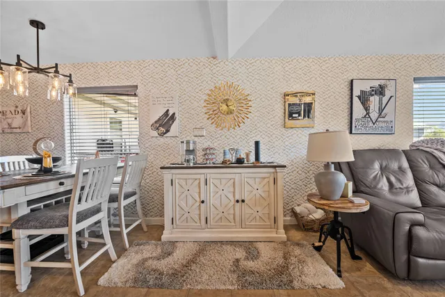 a view of a livingroom with furniture and wooden floor