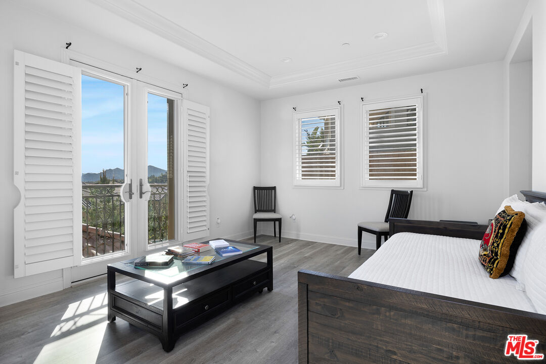 20234 Jubilee Way Porter Ranch, CA 91326 - Photo 23 of 30 a living room with furniture and a window