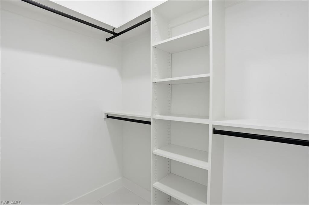 2930 20th Street Southwest Lehigh Acres, FL 33976 - Photo 23 of 43 a view of an empty walk in closet