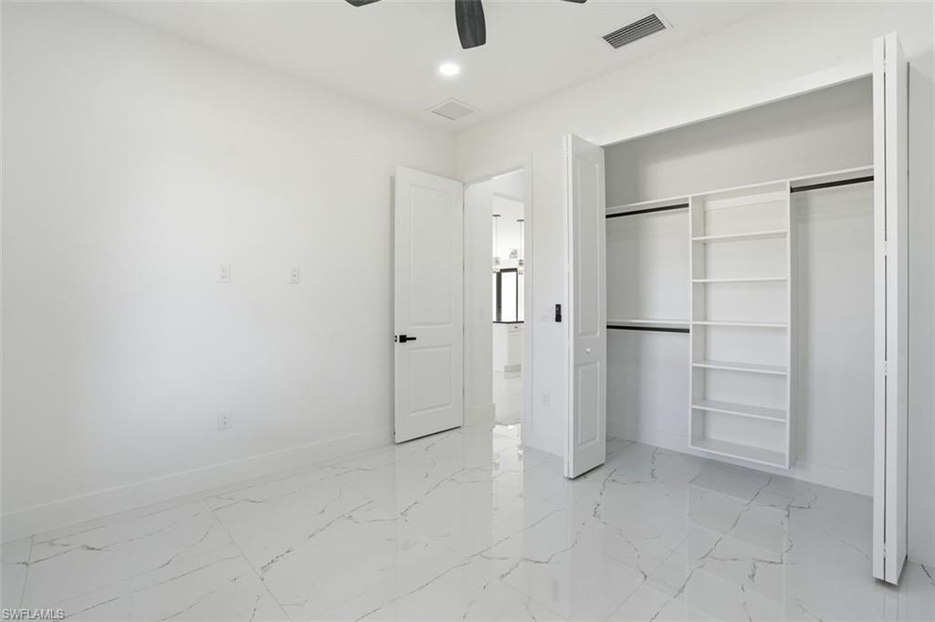 2930 20th Street Southwest Lehigh Acres, FL 33976 - Photo 27 of 43 a view of an empty room