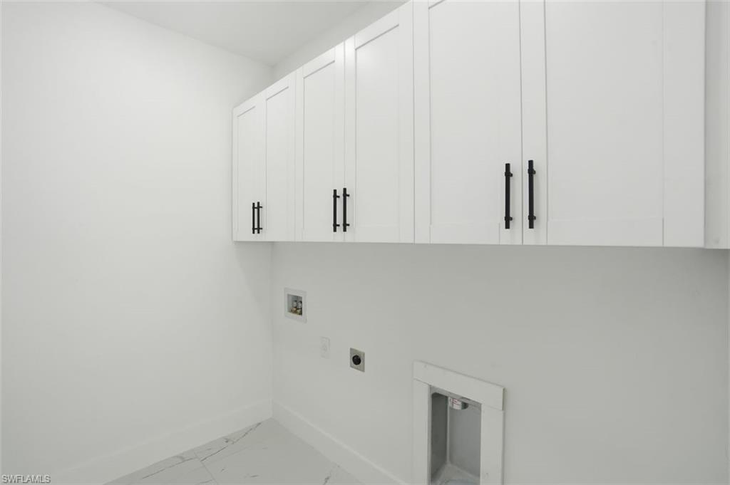 2930 20th Street Southwest Lehigh Acres, FL 33976 - Photo 28 of 43 a view of a closet