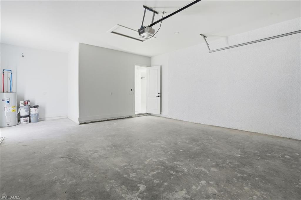 2930 20th Street Southwest Lehigh Acres, FL 33976 - Photo 29 of 43 a view of a room with closet and wooden floor