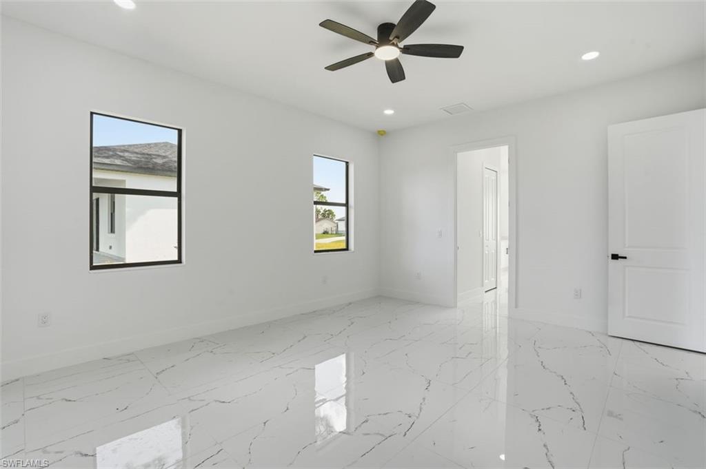 2930 20th Street Southwest Lehigh Acres, FL 33976 - Photo 31 of 43 a view of an empty room with a window