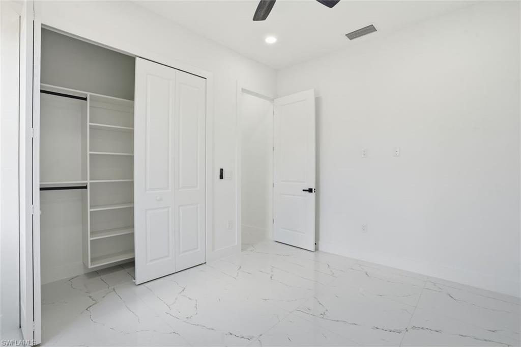 2930 20th Street Southwest Lehigh Acres, FL 33976 - Photo 35 of 43 a view of an empty room