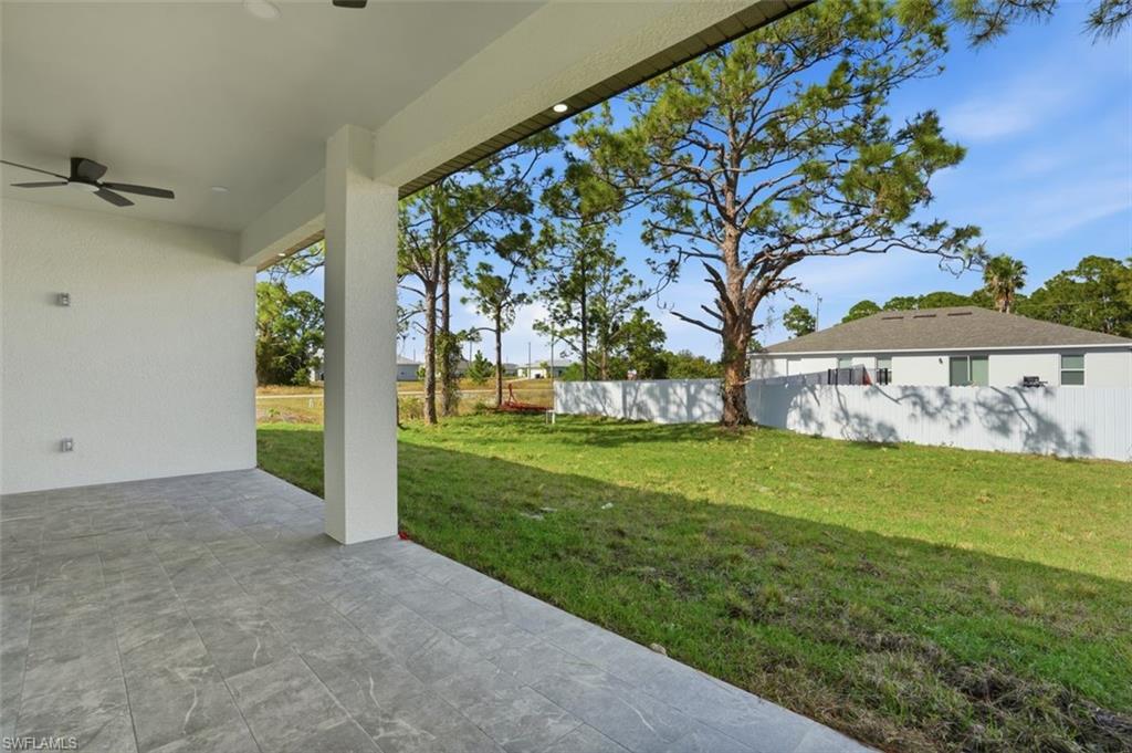 2930 20th Street Southwest Lehigh Acres, FL 33976 - Photo 39 of 43 a view of a garden with an outdoor space