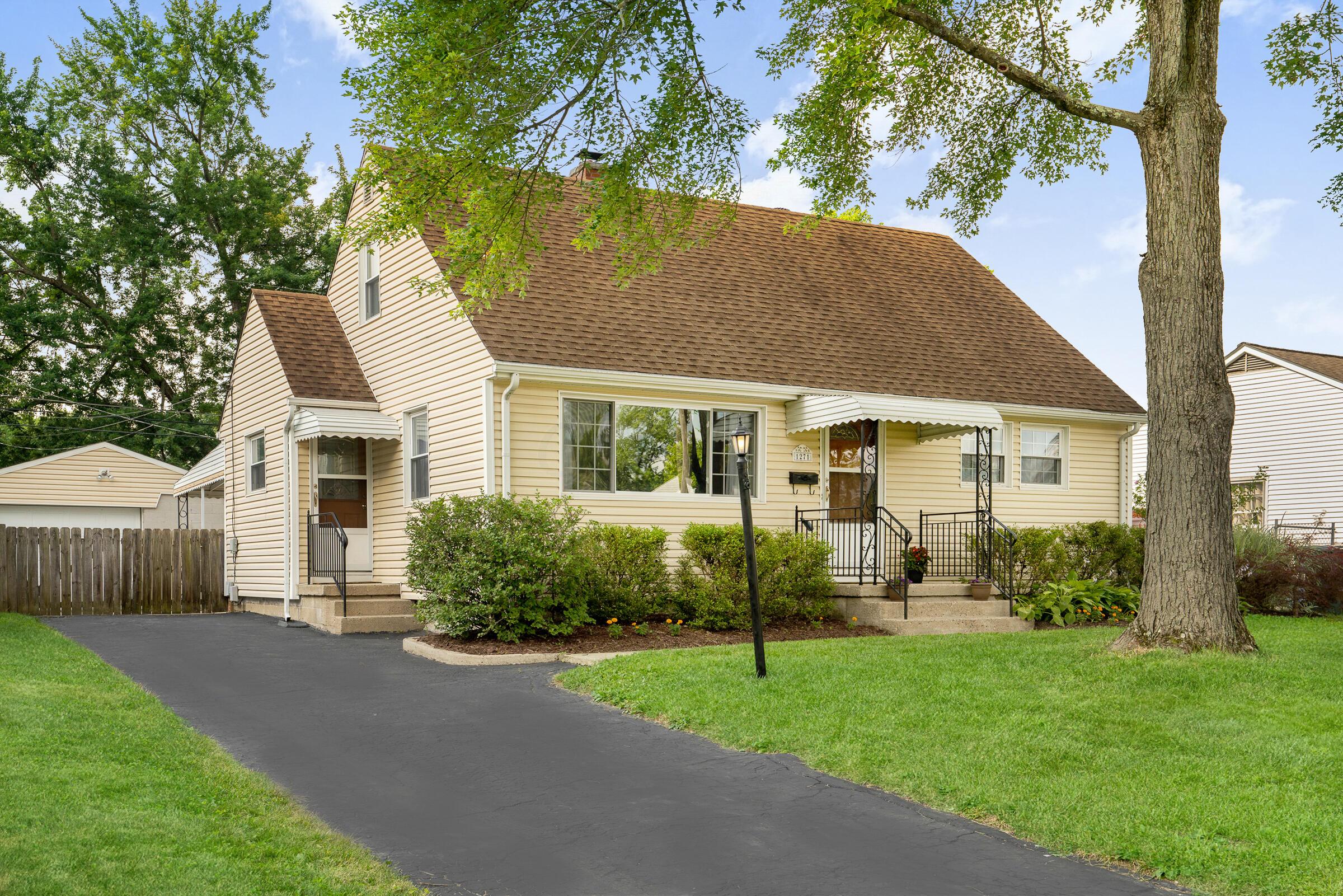 Move-in ready 3 BR Cape Cod with 1+ car garage, fenced yard, gorgeous wood floors & eat-in kitchen!