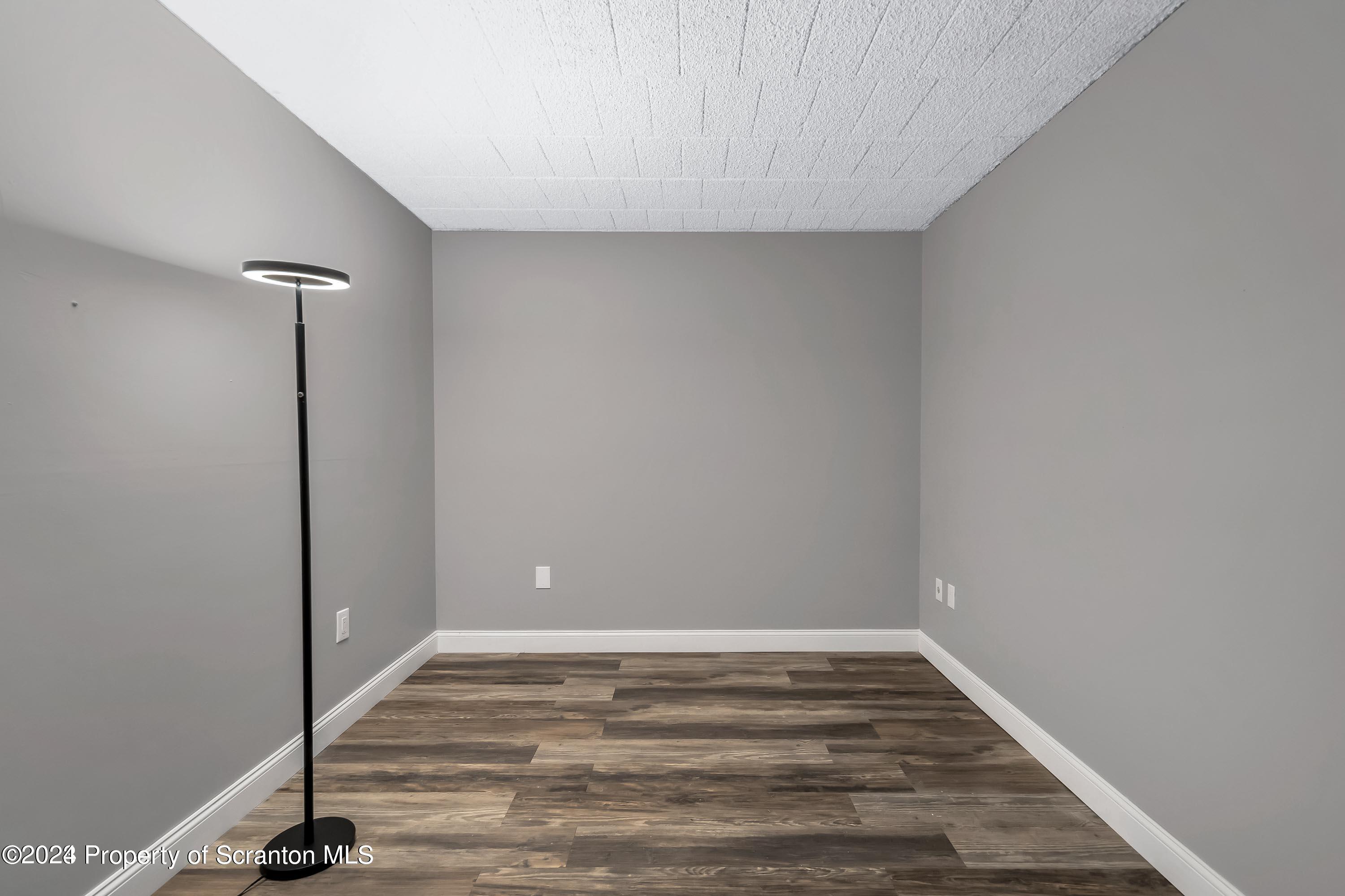 550 Clay Avenue, Unit 9B Scranton, PA 18510 - Photo 9 of 15 a view of room with wooden floor