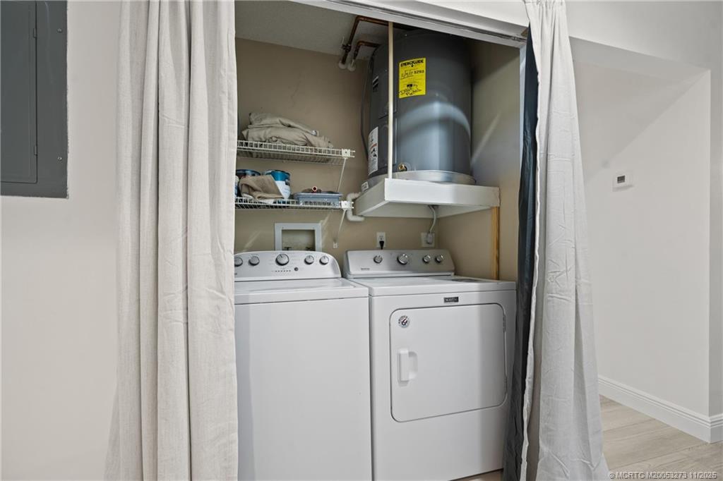 1210 Southeast Parkview Place, Unit 9 Stuart, FL 34994 - Photo 18 of 36 a view of washer and dryer