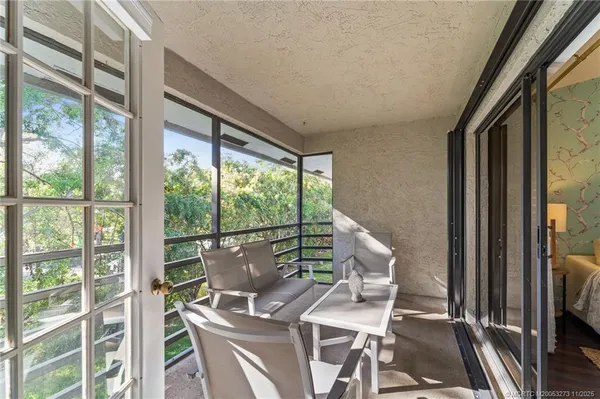 a view of balcony and workspace