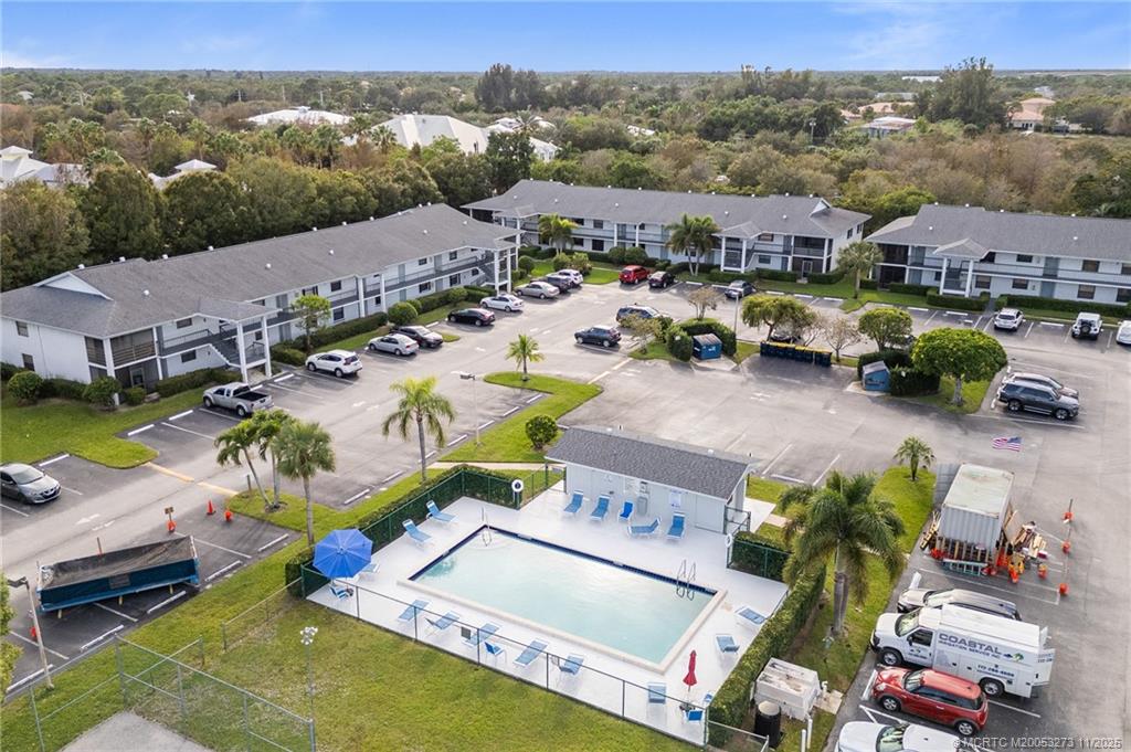 1210 Southeast Parkview Place, Unit 9 Stuart, FL 34994 - Photo 34 of 36 an aerial view of a house with a garden