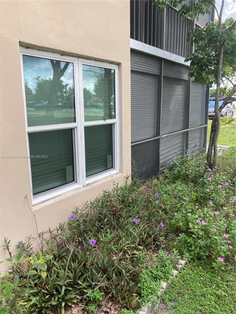 4172 Inverrary Drive, Unit 112 Lauderhill, FL 33319 - Photo 18 of 18 front view of a house with a yard