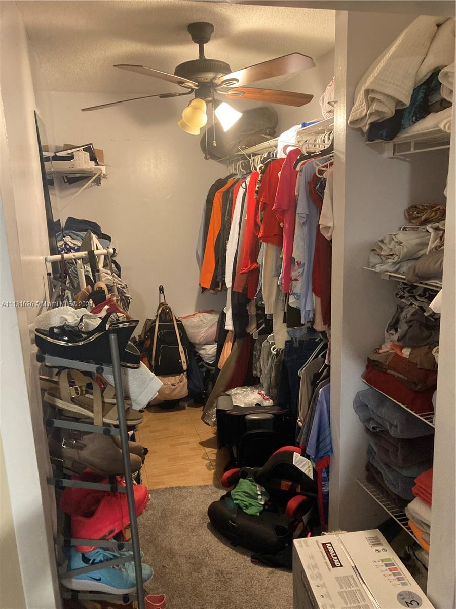 4172 Inverrary Drive, Unit 112 Lauderhill, FL 33319 - Photo 5 of 18 a view of a closet with storage